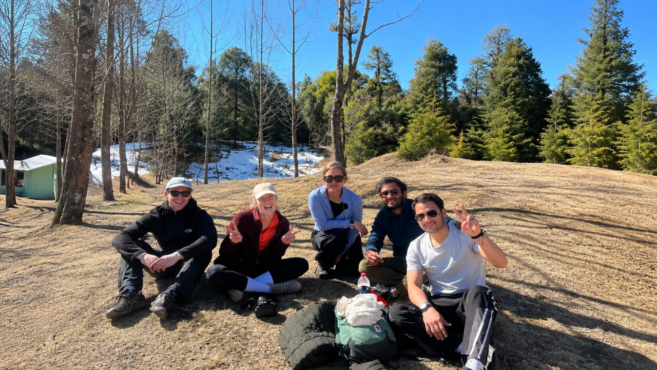 International yoga retreat participants relaxing during a Himalayan trekking experience in the 10-Day Himalayan Yoga Immersion Retreat