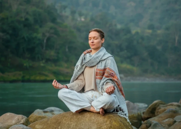 Meditation and pranayama enhancing focus in Rishikesh mountain retreat