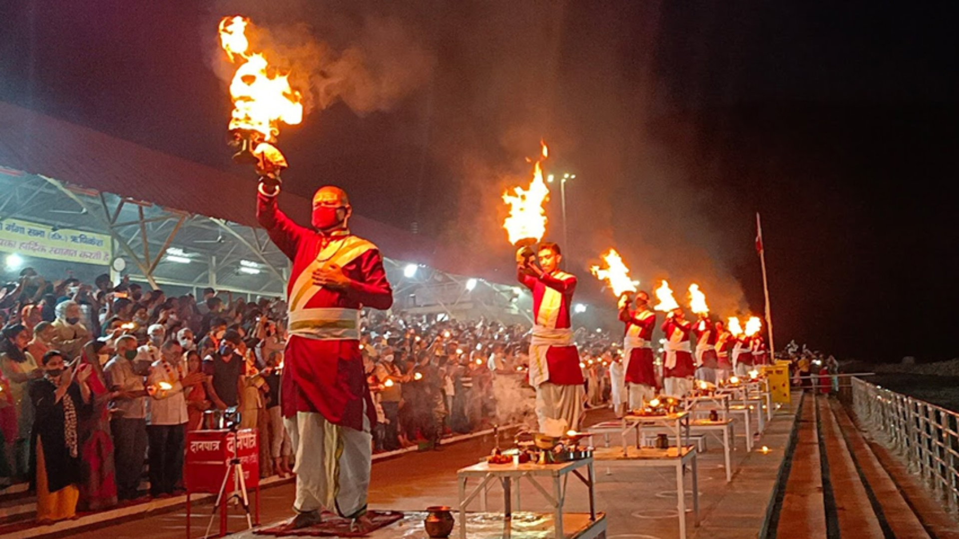 Floating lamps during Ganga Aarti with retreat participants