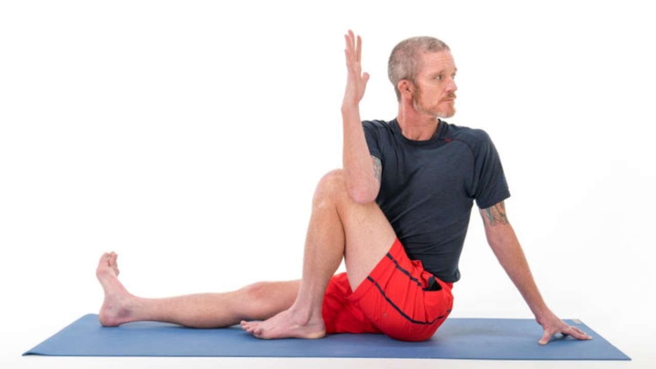 Seated spinal twist for digestive detox and gut cleansing