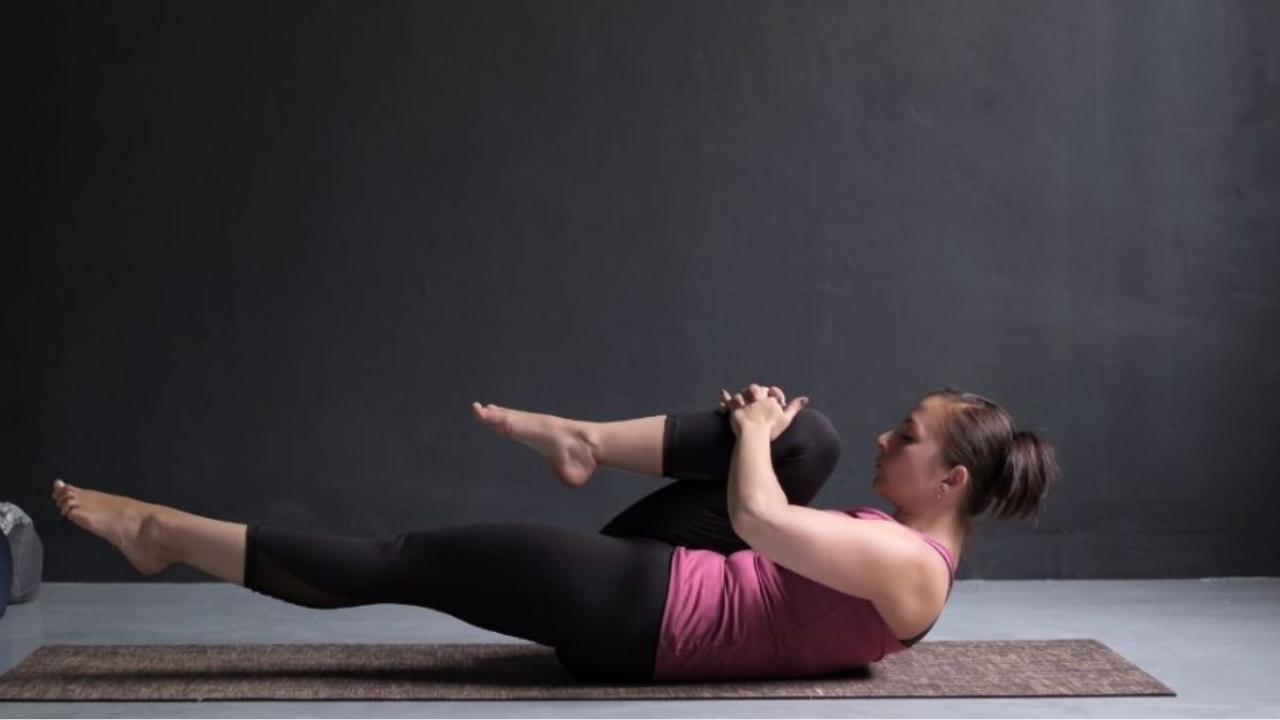 Wind relieving pose for gas and bloating relief